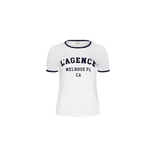 Tommie Crewneck Tee: A white short-sleeve ringer tee with black trim on the collar and sleeves, crafted from soft Supima cotton in a relaxed fit. Features bold black “LAGENCE MELROSE PL CA” lettering across the front.