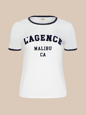The Tommie Crewneck Tee is a white Supima cotton ringer with black trim on the collar and sleeves, featuring bold LAGENCE MALIBU CA text on the front.