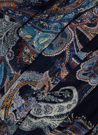 Le débardeur en maille froncée Rasha se distingue par son tissu foncé orné dun imprimé paisley « midnight » très travaillé, décliné dans des tons de bleu, marron, orange et crème. Des motifs floraux et feuillus tourbillonnants apportent de la profondeur au design, tandis que son encolure carrée élégante lui confère une touche moderne.