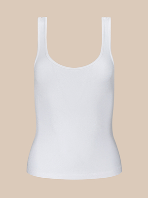 The Cole Scoopneck Tank is a plain white ribbed knit essential with wide straps and a scoop neckline, shown against a beige background.