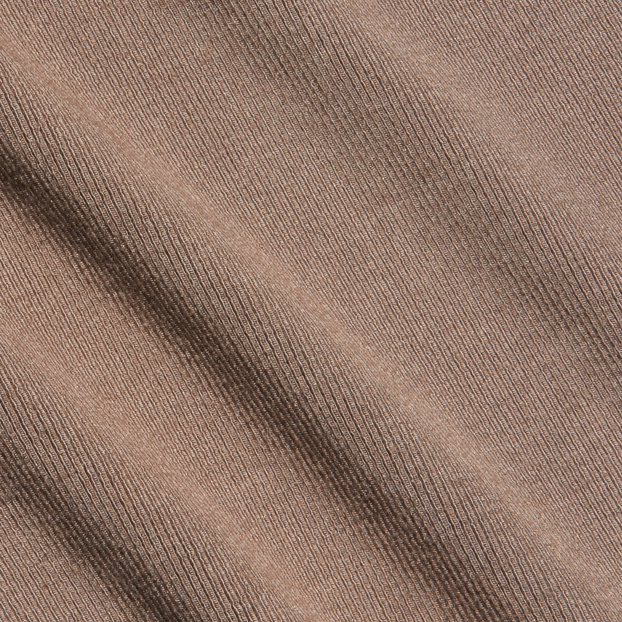 Close-up of the Lunara Camisole in brown micro modal ribbed fabric, featuring diagonal textured lines across the surface.