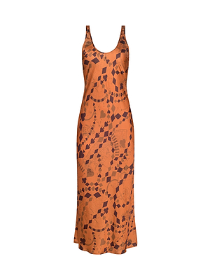 The L'AGENCE Akiya Satin Maxi Dress is a sleeveless, burnt orange bias-cut tank dress with a scoop neckline and abstract brown geometric and floral patterns, shown on a white background.