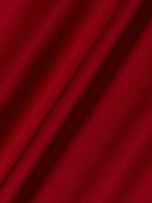 Close-up of the Akiya Satin Maxi Dress by L'AGENCE, showcasing its elegant red hue, smooth satin texture, and subtle diagonal folds that cast soft shadows across the surface.