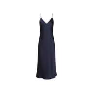 The Seridie Silk Slip Dress, in navy blue with thin spaghetti straps, a V-neckline, and a subtly flared hem, is displayed on a white background. This elegant midi dress is an ideal choice for a wedding guest.