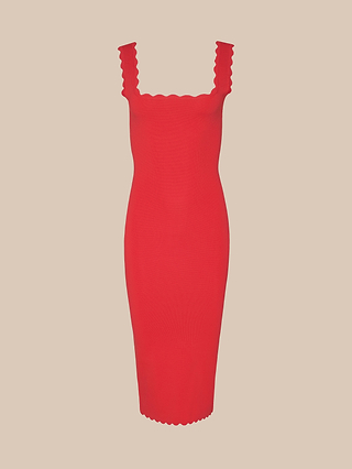 A fitted, knee-length lipstick red Romona Knit Dress featuring scalloped edges on the straps and hem, displayed against a plain beige background.