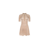 The Dakoa Knit Mini Dress is a short-sleeved, beige fit-and-flare style featuring a fitted bodice, button-up collar, and a flared, knee-length skirt adorned with intricate pointelle knit patterns and delicate detailing.