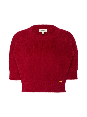 The Guinevere Cropped Pullover is an ultra-soft, bright red knit crewneck with half sleeves, a fuzzy texture, and a small gold tag near the bottom hem.