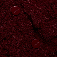 Mireille Fringe Cardigan in deep red, featuring a textured knit, fringed hem, and two matching round buttons.