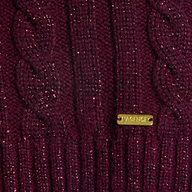 Close-up of the Bellini Cable-Knit Top in merlot red, featuring a sparkly wool-infused cable-knit fabric and a small gold rectangular tag engraved with LAGENCE.