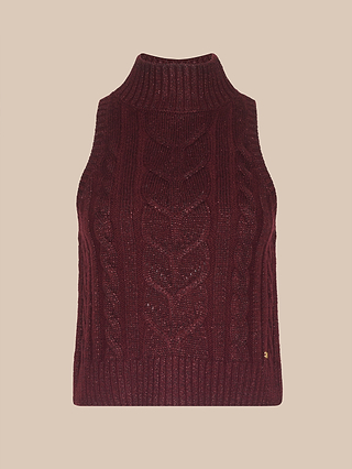 The Bellini Cable-Knit Top is a sleeveless, maroon sweater vest made from a wool-blend knit, highlighted by a chunky turtleneck and shown against a plain beige background.
