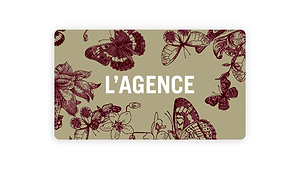 The L’AGENCE Gift Card is rectangular with a beige background and bold white logo, featuring dark red butterfly and flower illustrations. It includes email delivery plus instructions for redemption.