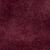A textured maroon or dark burgundy background with a cloudy, mottled appearance.