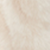 Close-up of a soft, cream-colored fuzzy texture.