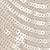 Close-up of a beige fabric featuring a circular, chain-link pattern.