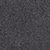 Close-up view of a textured dark gray surface, possibly asphalt or another rough material, showing small, uneven patterns throughout.