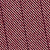 Close-up of a maroon fabric featuring a diagonal twill weave.