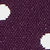 Dark purple fabric patterned with classic white polka dots.