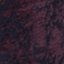 A close-up of a textured surface with maroon and dark purple colors blending together, creating a mottled, abstract pattern.
