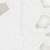 White fabric featuring intricate laser-cut floral patterns.