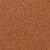 A close-up view of a textured brown surface, resembling leather or a similar material, with a consistent pebbled pattern throughout.