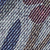 Close-up of a blue and white denim fabric texture.