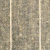 Gros plan dune surface texturée en béton ou en asphalte avec deux lignes blanches parallèles verticales, ressemblant à une section de route ou de trottoir.