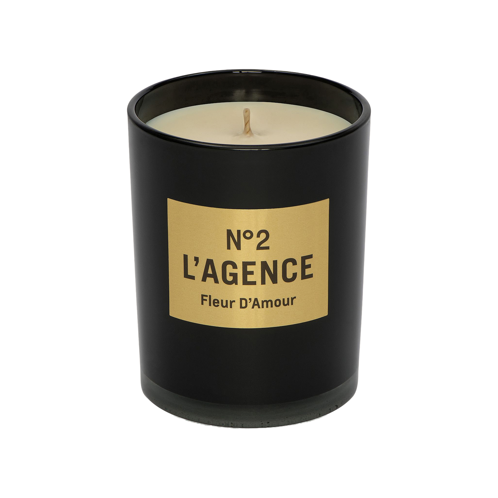 A black candle jar labeled N°2 LAGENCE Fleur D’Amour with a gold label is shown from the front against a plain white background. This elegant piece features hand-poured candles crafted from soy-blend wax and infused with the enticing scent of baccara rose.