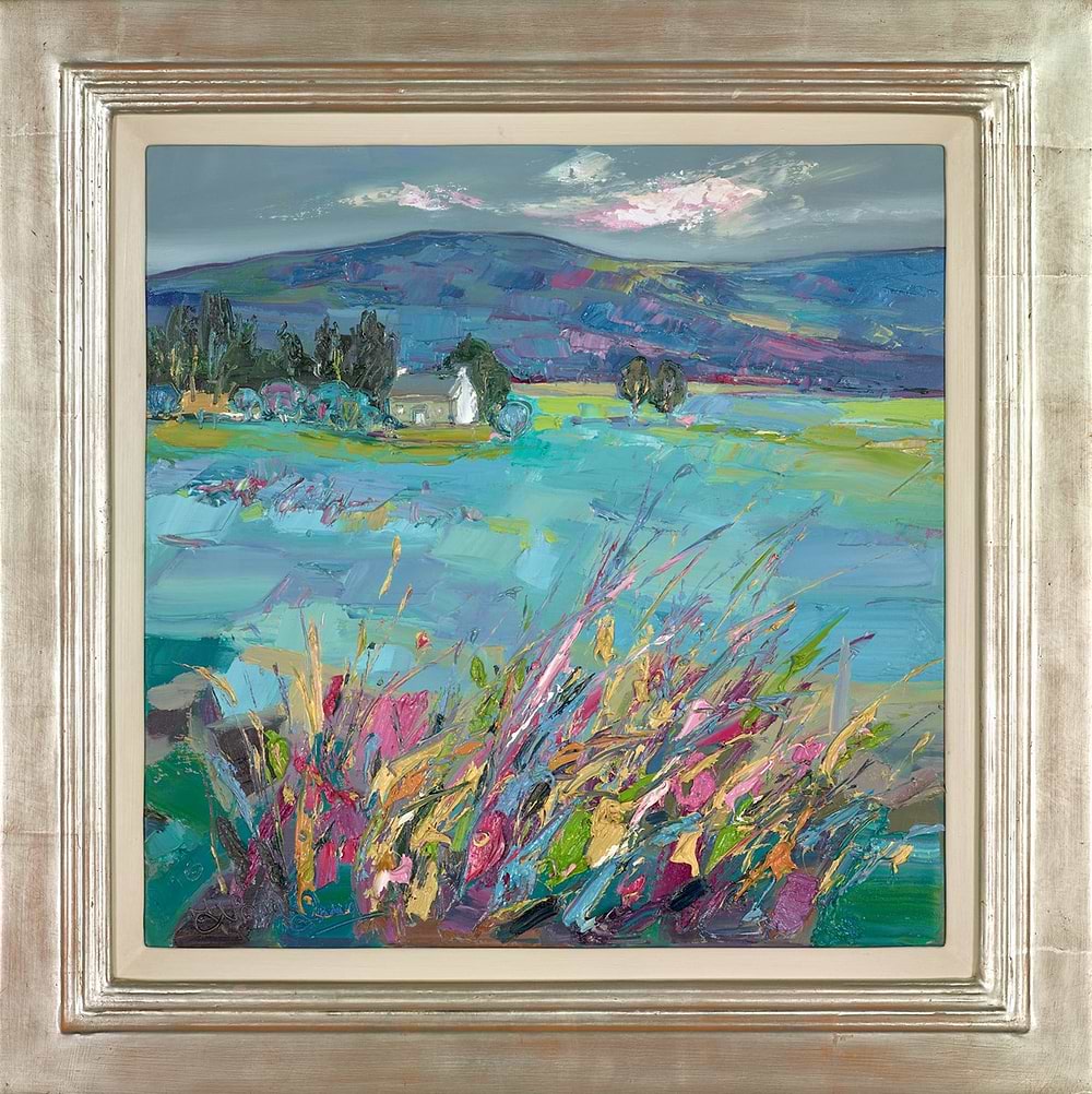 Cottage through spring grasses
