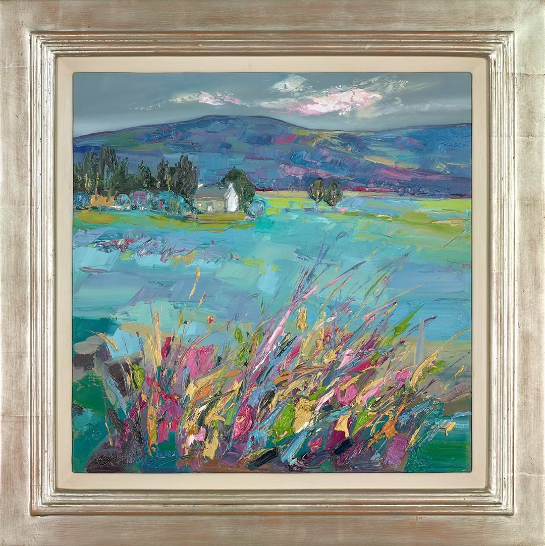 Cottage through spring grasses