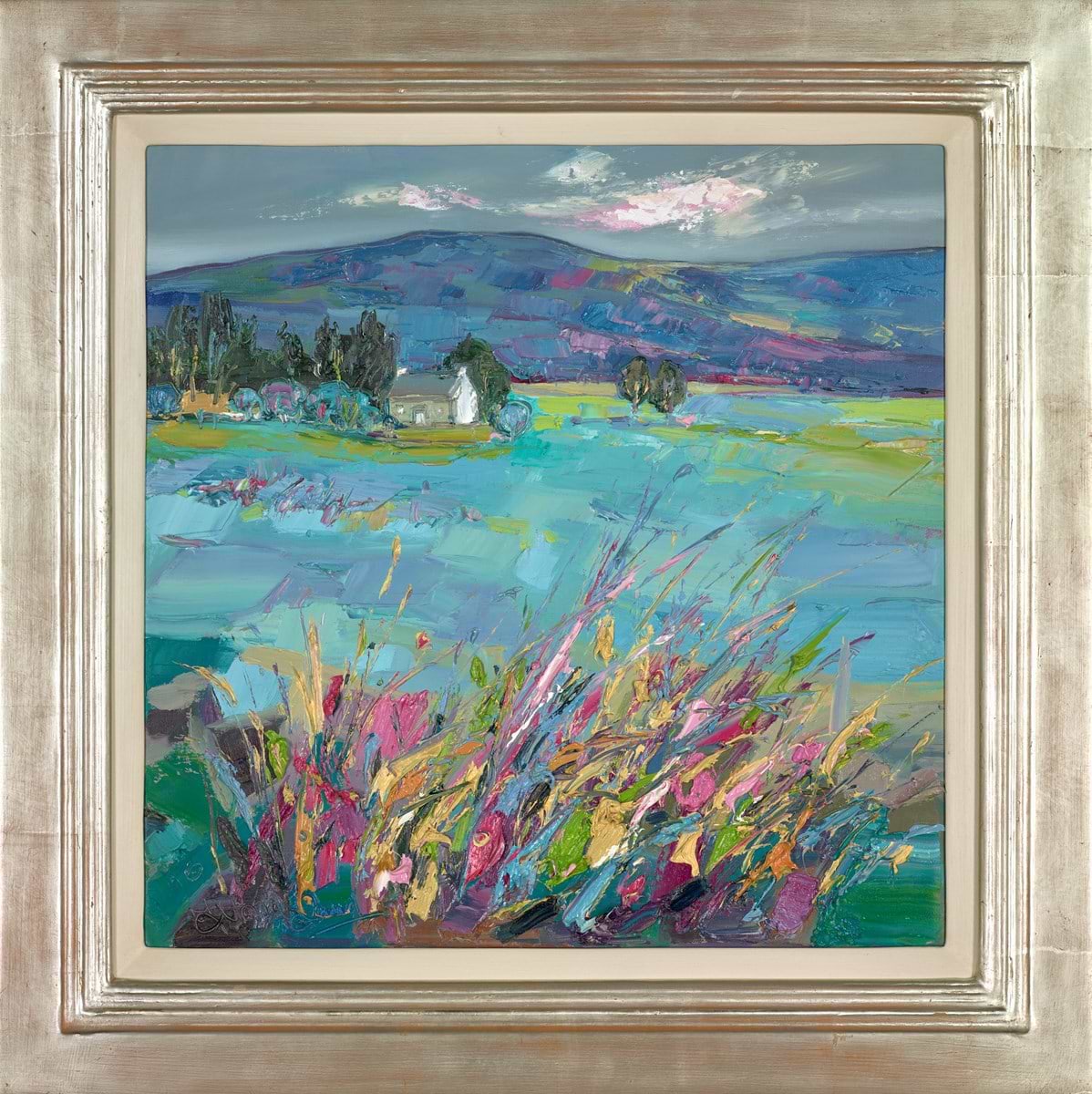 Cottage through spring grasses
