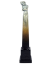 Decorative statue with a gradient design on a black base against a white background