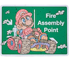 Colorful cartoon character on a green sign with 'Fire Assembly Point' text.