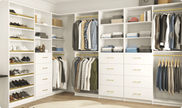Alto walk-in closet featuring hanging, shelving, & drawers