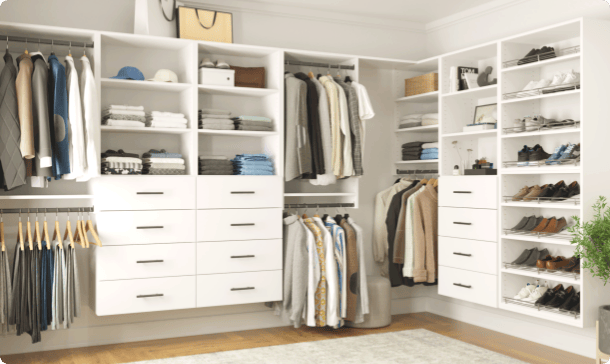Vista walk-in closet featuring hanging, shelving, & drawers