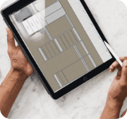Person using a tablet & stylus to create a custom modular closet design on a 3D digital planning tool
