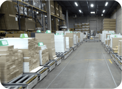 Wide warehouse view showing products ready for shipping