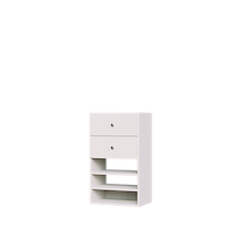 White closet drawer tower with slab fronts and shelves for reach-in folded clothing storage.