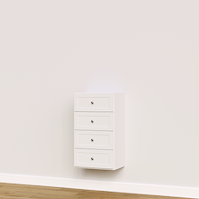 White shaker built-in closet drawers for custom wardrobe and closet systems.