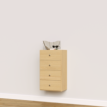 Natural oak closet drawers with slab fronts for linens, towels, and folded clothing.