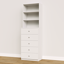 White built-in closet drawers with slab fronts for folded clothing and accessory storage.