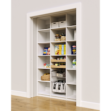 White 54 inch reach in pantry featuring mixed storage with wood drawers and pull-out wire baskets.