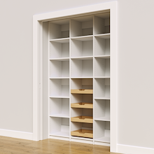 White 57 inch reach in pantry with four wood pull-out drawers for grocery storage.