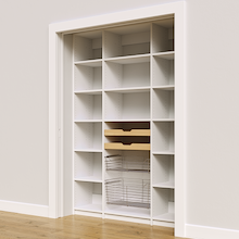 60 inch white pantry with adjustable shelves, two wood pull-out drawers, and two pull-out wire baskets.