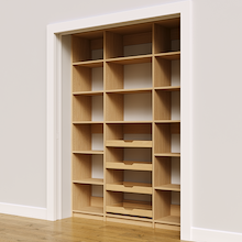 63 inch open pantry shelving in natural oak with four wood drawers.
