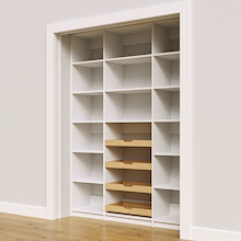 63 inch white reach in pantry shelving with four wood pull-out drawers.