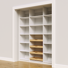 Four wood pull-out drawers in a 66 inch white kitchen pantry.