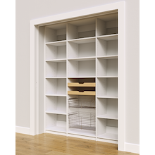 White 69 inch pantry shelving with two wood pull-out drawers and two pull-out wire baskets.