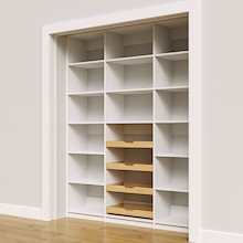 White 69 inch pantry shelving with four wood pull-out drawers.