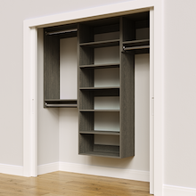 Grey 73.5-inch woodgrain Vista Total Closet Kit, angled view, empty, with tall hanging in a reach-in closet
