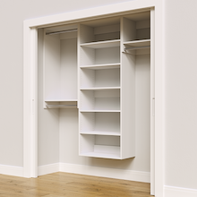 White 73.5-inch Vista Total Closet Kit, angled view, empty, with tall hanging in a reach-in closet